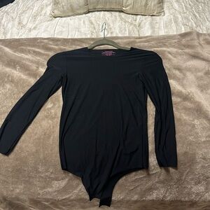 Commando black, long sleeve bodysuit. Washed but never worn out of the house
